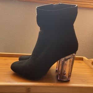 Black zip up clear heel boot